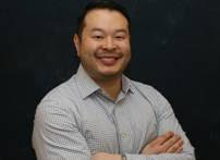 Profile photo of Dr. Alan Chen smiling, a leading Beaverton Dentist.